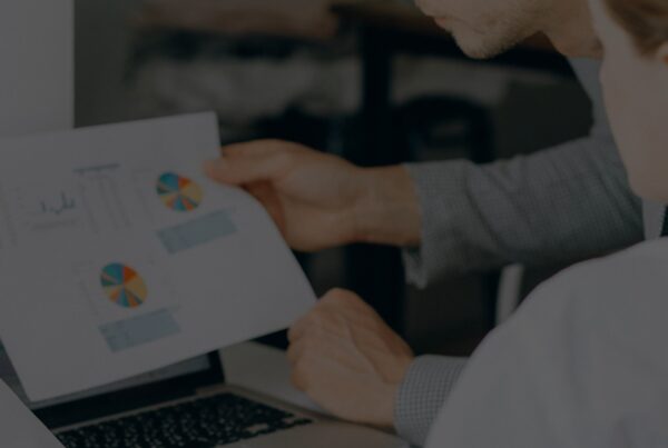 sales people looking over enablement tools