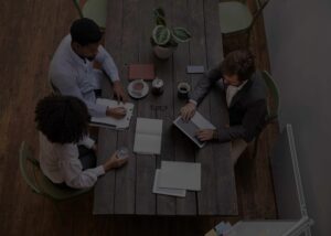 PBM proposal team collaboration, business professionals reviewing proposals, outsourcing content for PBMs, RFP strategy meeting, proposal writing support