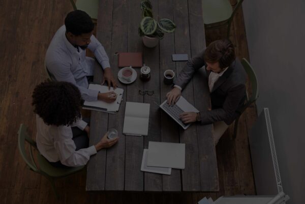 PBM proposal team collaboration, business professionals reviewing proposals, outsourcing content for PBMs, RFP strategy meeting, proposal writing support